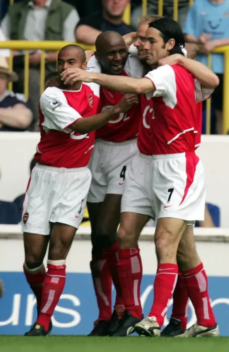 Framed Print : Unforgettable Rivalry: Vieira and Pires Euphoric Goal Celebration at White Hart Lane, 2004 Framed Print : Unforgettable Rivalry: Vieira and Pires Euphoric Goal Celebration at White Hart Lane, 2004