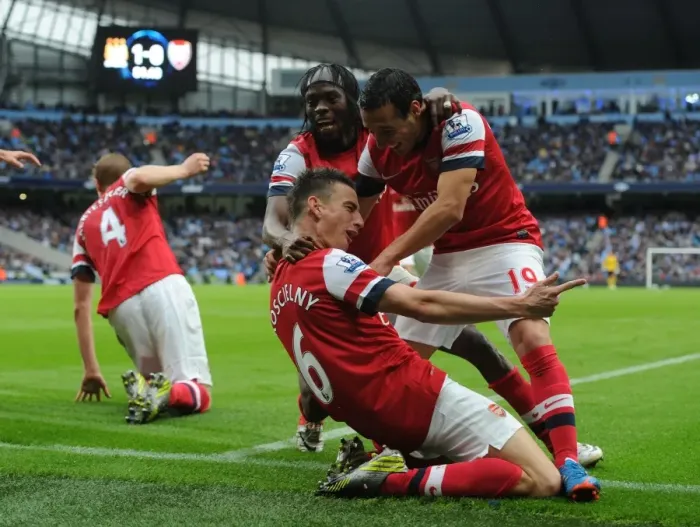 Framed Print : Unforgettable Victory: Koscielny, Gervinho, Cazorla, and Mertesacker's Goal Celebration - The Unbreakable Arsenal Bond (2012-13) Framed Print : Unforgettable Victory: Koscielny, Gervinho, Cazorla, and Mertesacker's Goal Celebration - The Unbreakable Arsenal Bond (2012-13)