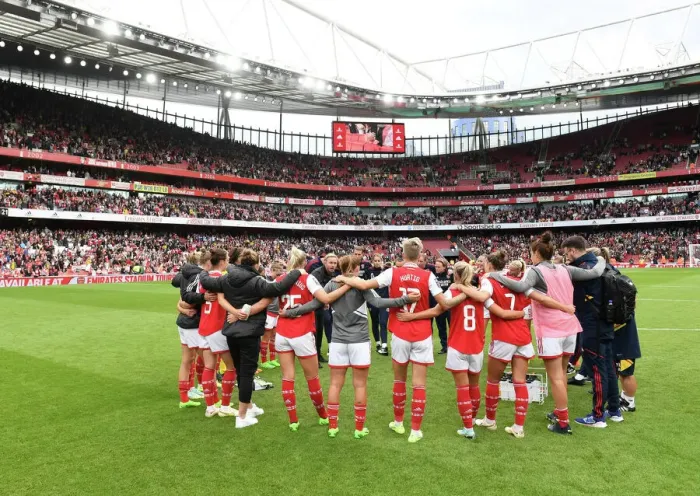 Framed Print : United in Determination: Arsenal and Tottenham Women Post-Match Huddle at Emirates Stadium Framed Print : United in Determination: Arsenal and Tottenham Women Post-Match Huddle at Emirates Stadium