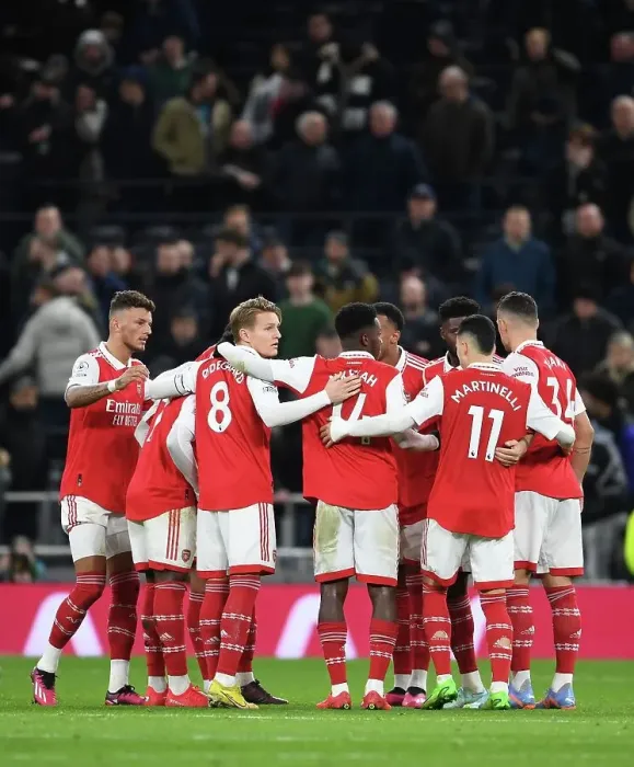 Framed Print : United in Determination: Arsenal's Half-Time Huddle vs. Tottenham Hotspur in the 2022-23 Premier League