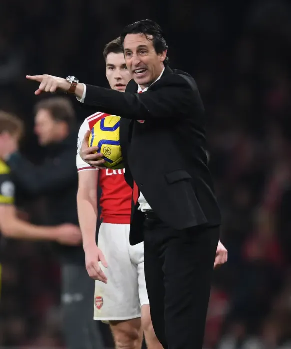 Framed Print : United in Focus: Emery and Tierney's Intense Conversation at Arsenal's Emirates Stadium