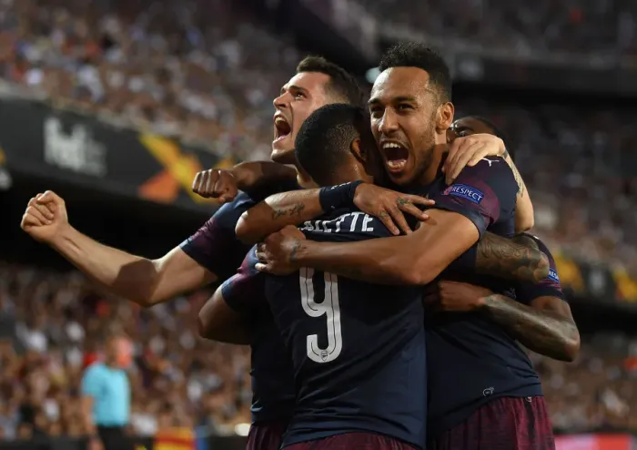 Framed Print : United in Victory: Aubameyang, Lacazette, and Xhaka's Goal Celebration - Arsenal's Europa League Semi-Final Triumph over Valencia