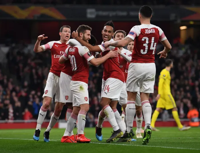 Framed Print : United in Victory: Mustafi and Aubameyang's Europa League Goal Celebration (Arsenal FC) Framed Print : United in Victory: Mustafi and Aubameyang's Europa League Goal Celebration (Arsenal FC)