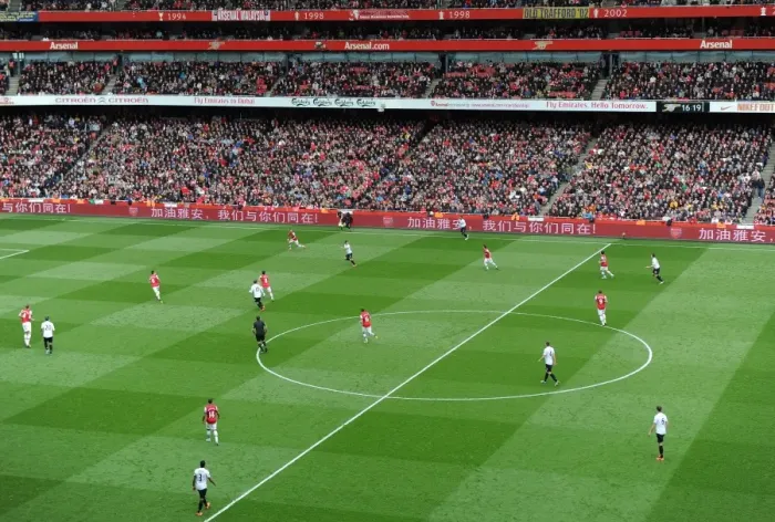 Framed Print : Unity in Football: Arsenal Stands with China Amidst Earthquake Tragedy (Arsenal vs. Manchester United, 28 / 4 / 13)
