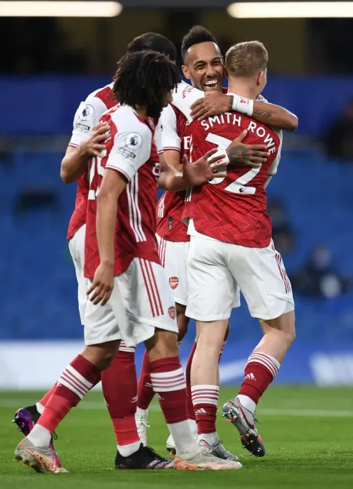 Framed Print : Unstoppable Arsenal: Smith Rowe and Aubameyang's Goal Celebration at Empty Stamford Bridge