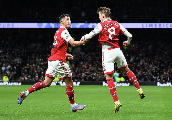Unstoppable Duo: Odegaard and Xhaka's Unforgettable Goal Celebration in Arsenal's Triumph over Tottenham (2022-23)