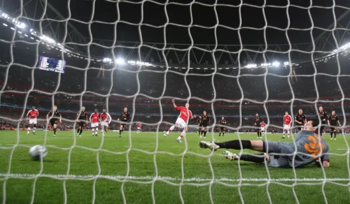 Framed Print : Van Persie Scores Penalty: Arsenal Leads AS Roma 1-0 in Champions League