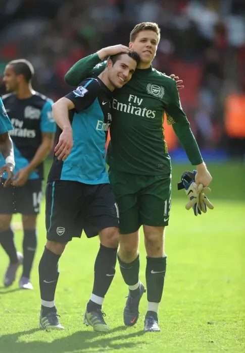 Framed Print : Van Persie and Szczesny: Arsenal's Unstoppable Duo Celebrate Victory at Anfield, 2012 Framed Print : Van Persie and Szczesny: Arsenal's Unstoppable Duo Celebrate Victory at Anfield, 2012