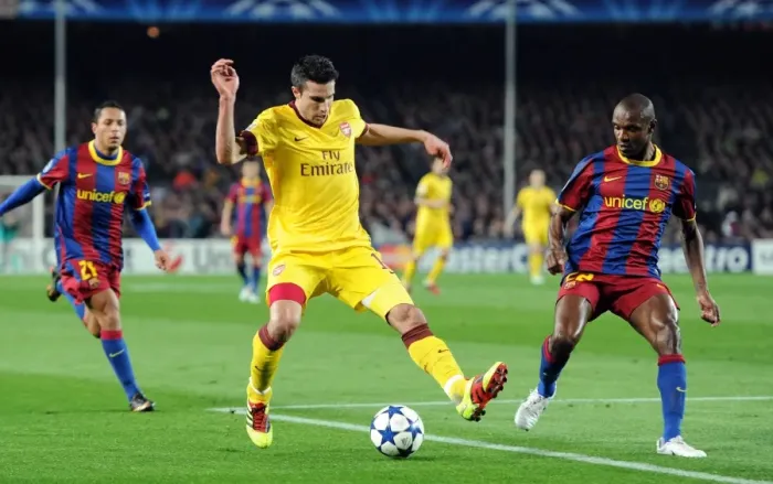 Framed Print : Van Persie vs. Abidal: Barcelona's Triumph over Arsenal in the Champions League (2011)