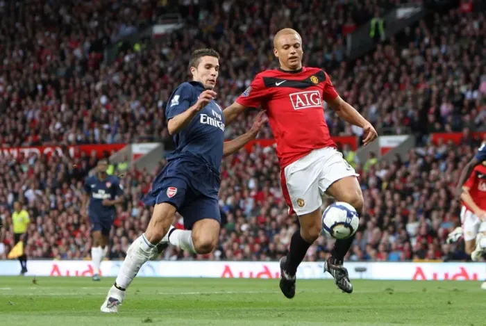 Framed Print : Van Persie vs. Brown: A Rivalry Ignites - Manchester United 2:1 Arsenal, Barclays Premier League, Old Trafford, 29 / 8 / 09 Framed Print : Van Persie vs. Brown: A Rivalry Ignites - Manchester United 2:1 Arsenal, Barclays Premier League, Old Trafford, 29 / 8 / 09