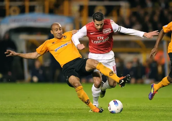 Framed Print : Van Persie vs. Henry: Intense Clash Between Wolverhampton and Arsenal (2011-12)