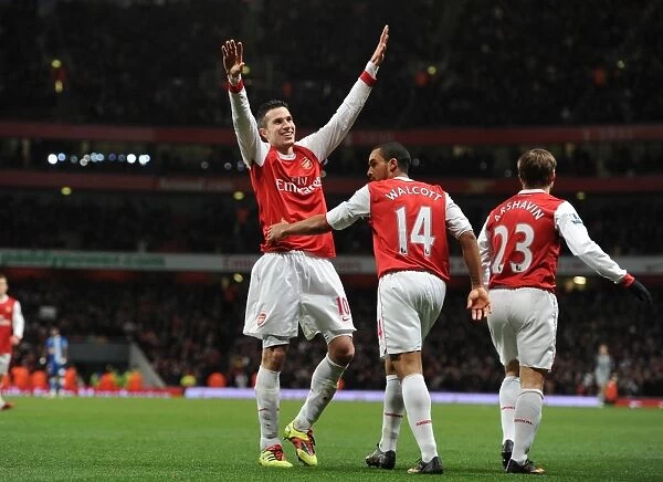 Van Persie and Walcott: Arsenal's Unstoppable Duo Celebrate 3-0 Over Wigan