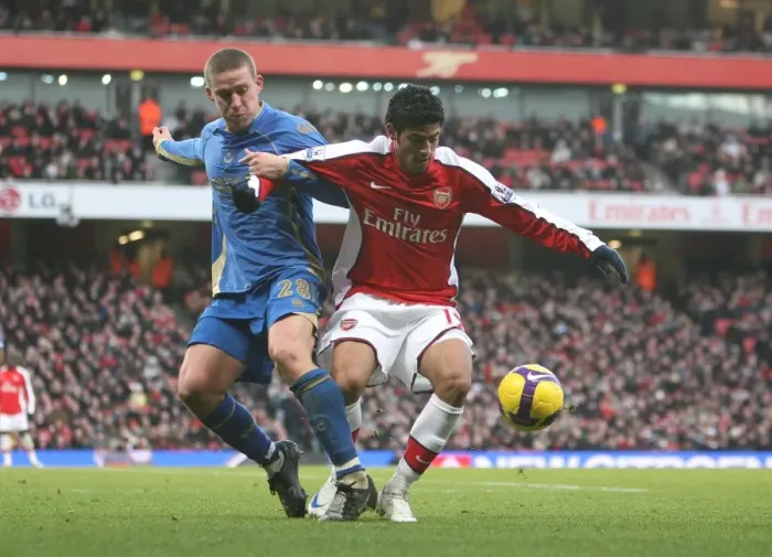 Framed Print : Vela vs. Davis: Arsenal's Edge over Portsmouth in the Premier League Clash, December 2008 Framed Print : Vela vs. Davis: Arsenal's Edge over Portsmouth in the Premier League Clash, December 2008