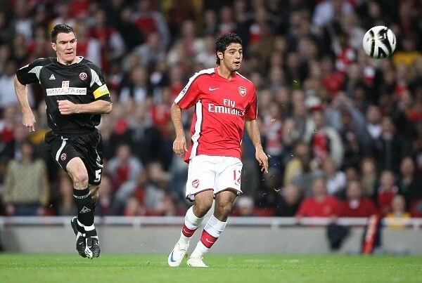 Vela's Stunner: Arsenal's 6-0 Thrashing of Sheffield United in Carling Cup