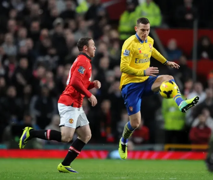 Framed Print : Vermaelen vs. Rooney: Battle at Old Trafford - Manchester United vs. Arsenal, Premier League 2013-14 Framed Print : Vermaelen vs. Rooney: Battle at Old Trafford - Manchester United vs. Arsenal, Premier League 2013-14