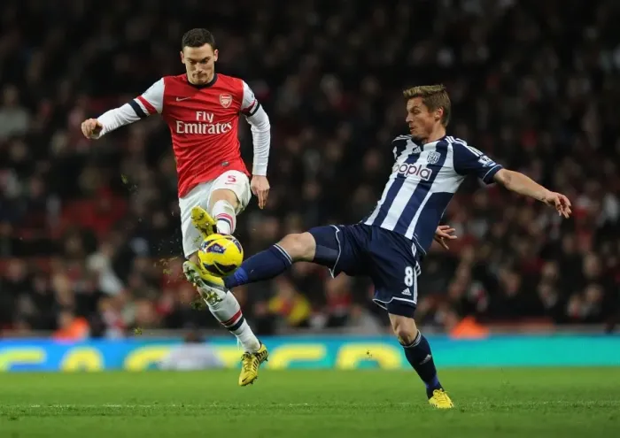 Framed Print : Vermaelen vs. Rosenberg: A Premier League Showdown at Emirates Stadium Framed Print : Vermaelen vs. Rosenberg: A Premier League Showdown at Emirates Stadium