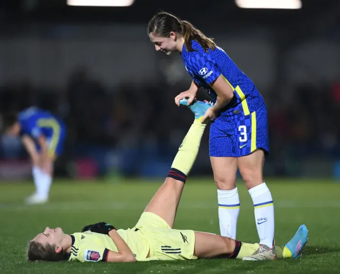 Framed Print : Vivianne Miedema Stretches Cramp in Intense Chelsea Women vs Arsenal Women FA WSL Clash