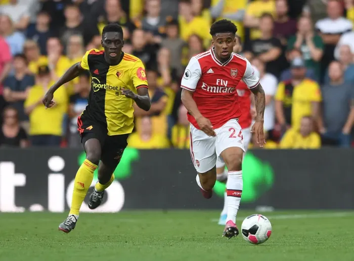 Framed Print : Watford vs Arsenal: Nelson vs Sarr Clash in Premier League Showdown Framed Print : Watford vs Arsenal: Nelson vs Sarr Clash in Premier League Showdown
