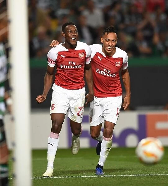 Welbeck and Aubameyang Celebrate Arsenal's Goal Against Sporting Lisbon in Europa League