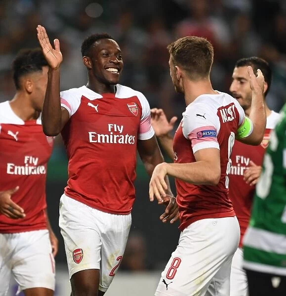 Welbeck and Ramsey Celebrate Arsenal's Goal in Europa League Clash vs Sporting Lisbon