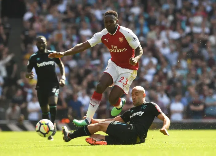 Framed Print : Welbeck Soars Past Zabaleta: Thrilling Moment from Arsenal vs. West Ham Clash Framed Print : Welbeck Soars Past Zabaleta: Thrilling Moment from Arsenal vs. West Ham Clash