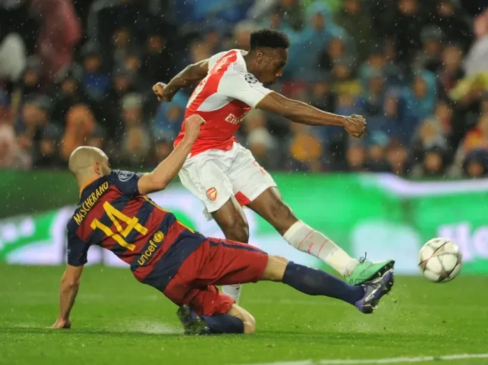 Framed Print : Welbeck vs. Mascherano: A Tense Shooting Showdown in the Barcelona vs. Arsenal UEFA Champions League Clash