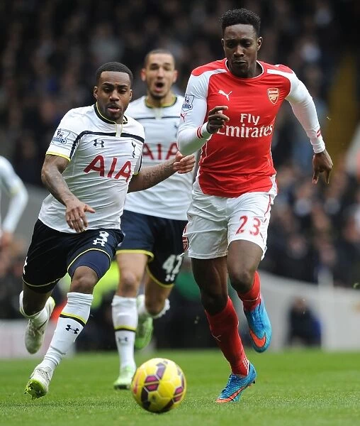 Welbeck vs. Rose: Intense Battle in the 2014-15 Tottenham vs. Arsenal Premier League Clash