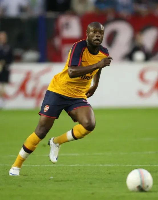 Framed Print : William Gallas Leads Arsenal to 2-0 Victory over FC Twente in Champions League Qualifier