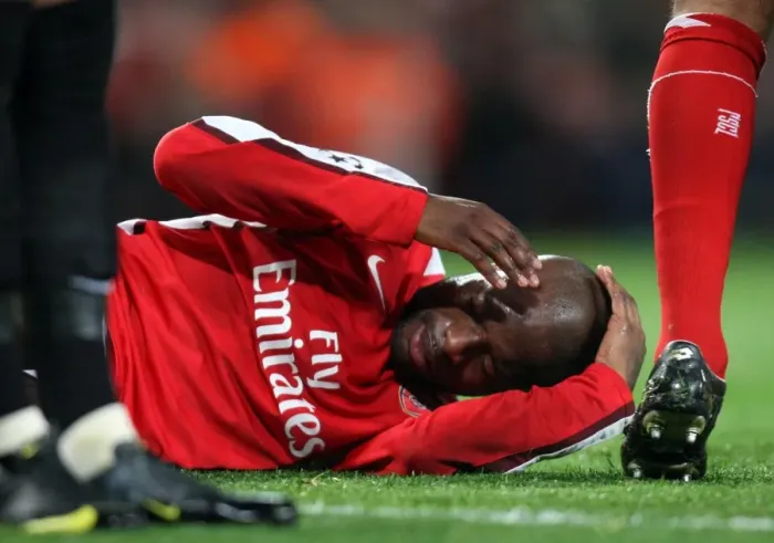 Framed Print : William Gallas in Pain: Arsenal's Clash of Heads with Andrey Arshavin during UEFA Champions League Match vs Standard Liege Framed Print : William Gallas in Pain: Arsenal's Clash of Heads with Andrey Arshavin during UEFA Champions League Match vs Standard Liege