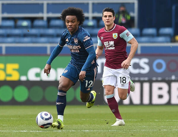Willian in Action: Arsenal vs. Burnley Amidst Empty Stands (2021)