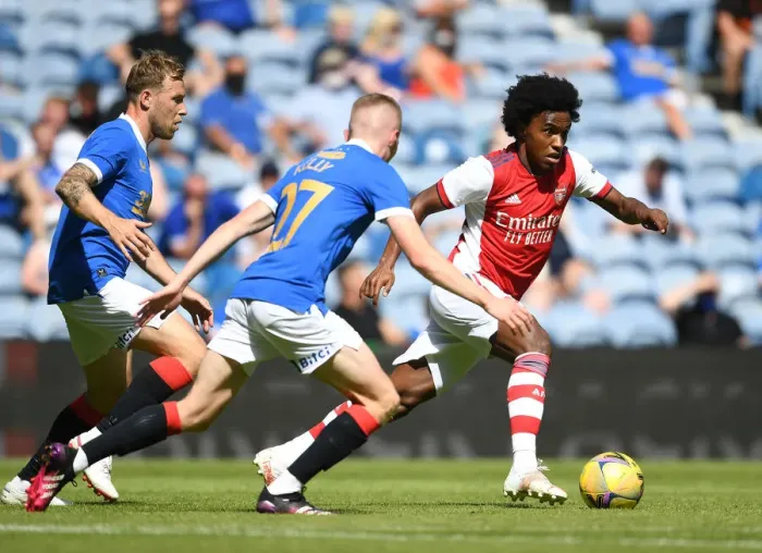 Framed Print : Willian Clashes with Rangers Airfield and Kelly in Arsenal's Pre-Season Friendly at Ibrox Stadium Framed Print : Willian Clashes with Rangers Airfield and Kelly in Arsenal's Pre-Season Friendly at Ibrox Stadium