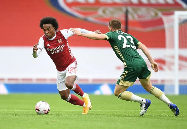 Willian Outmaneuvers Osborn: Arsenal's Triumph in Empty Emirates Against Sheffield United