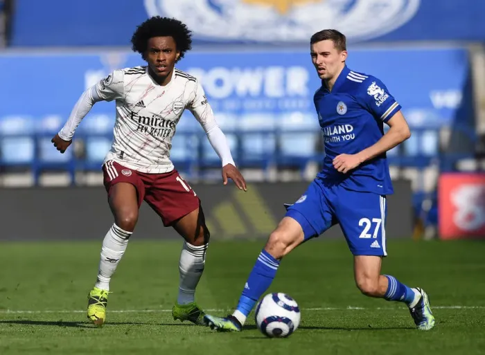 Framed Print : Willian vs. Castagne: A Football Showdown at The King Power Stadium