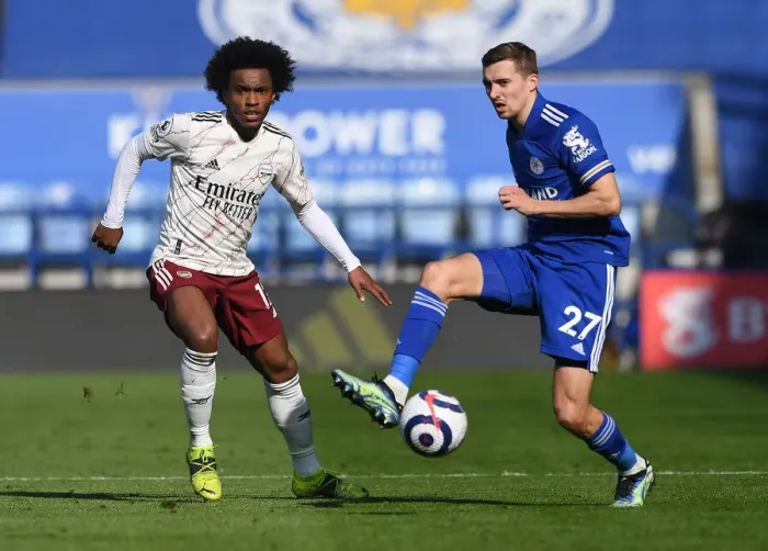 Framed Print : Willian vs. Castagne: Intense Battle in Leicester City vs. Arsenal Premier League Clash Framed Print : Willian vs. Castagne: Intense Battle in Leicester City vs. Arsenal Premier League Clash