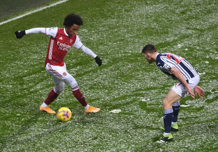 Framed Print : Willian vs Dara O'Shea: Intense Battle in West Bromwich Albion vs Arsenal Premier League Clash