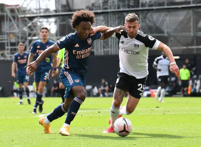Framed Print : Willian vs. Joe Bryan: Battle at Craven Cottage - Fulham vs. Arsenal, Premier League 2020-21