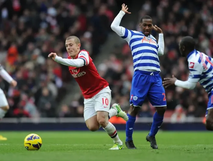 Framed Print : Wilshere Outmaneuvers Hoilett: Arsenal vs. Queens Park Rangers, 2012-13 Premier League