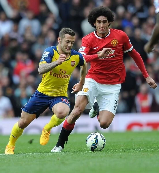 Wilshere Surges Past Fellaini: Manchester United vs. Arsenal, Premier League 2014-15 - Intense Rivalry on the Field