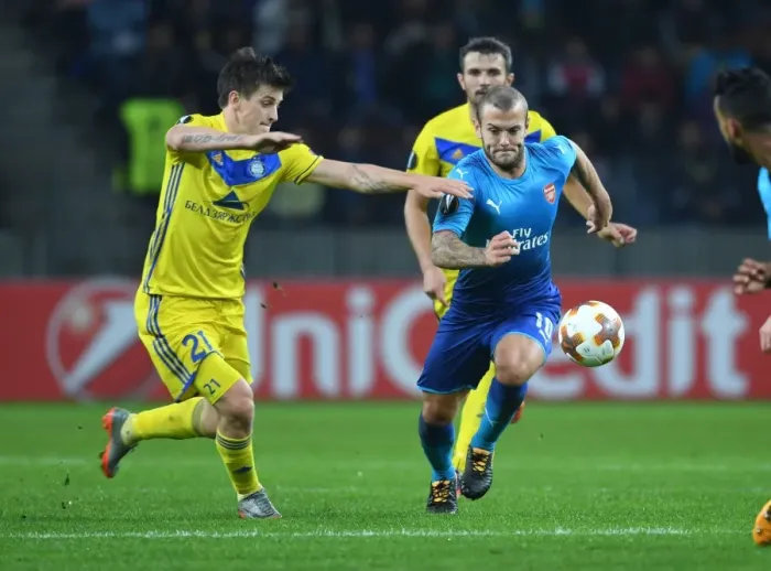 Framed Print : Wilshere vs. Dragun: A Europa League Battle - Arsenal's Jack Wilshere Takes on FC BATE Borisov's Stanislav Dragun Framed Print : Wilshere vs. Dragun: A Europa League Battle - Arsenal's Jack Wilshere Takes on FC BATE Borisov's Stanislav Dragun