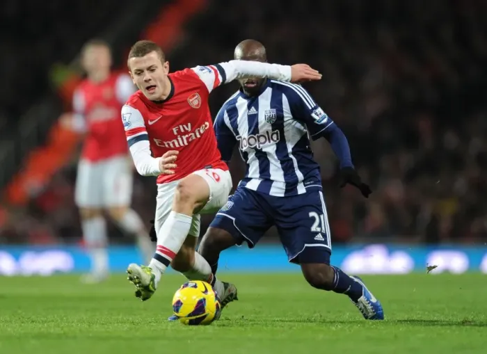 Framed Print : Wilshere vs. Mulumbu: Foul Incident - Arsenal vs. West Bromwich Albion (2012-13)