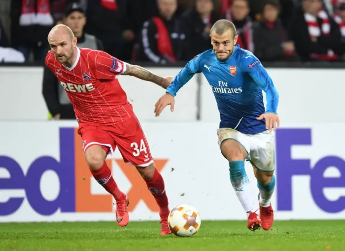 Framed Print : Wilshere vs. Rausch: A Europa League Battle - Arsenal's Jack Wilshere Goes Head-to-Head with FC Koln's Konstanin Rausch Framed Print : Wilshere vs. Rausch: A Europa League Battle - Arsenal's Jack Wilshere Goes Head-to-Head with FC Koln's Konstanin Rausch