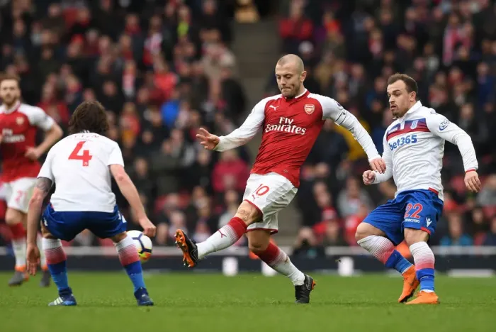 Framed Print : Wilshere vs Shaqiri: Intense Battle at Emirates Stadium - Arsenal v Stoke City, Premier League