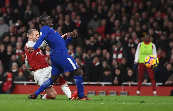 Framed Print : Wilshere's Intense Goal Against Kante: A Premier League Battle