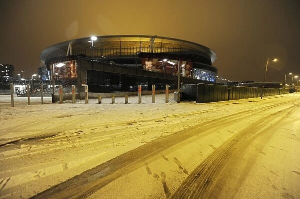 Winter's Embrace at Emirates: Arsenal Football Club under Snow