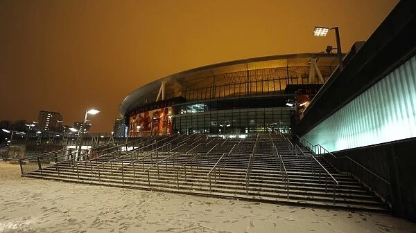 Winter's Embrace at Emirates: Arsenal Football Club in a Snow-Covered Stadium