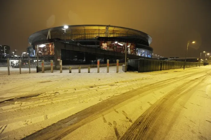 Framed Print : Winter's Embrace at Emirates: Arsenal Football Club under Snow
