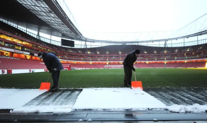 Framed Print : Winter's Embrace at Emirates: Arsenal's Stadium Transformed in Snow
