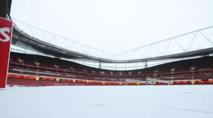 Framed Print : Winter's Embrace at Emirates: Arsenal's Stadium Transformed in Snow