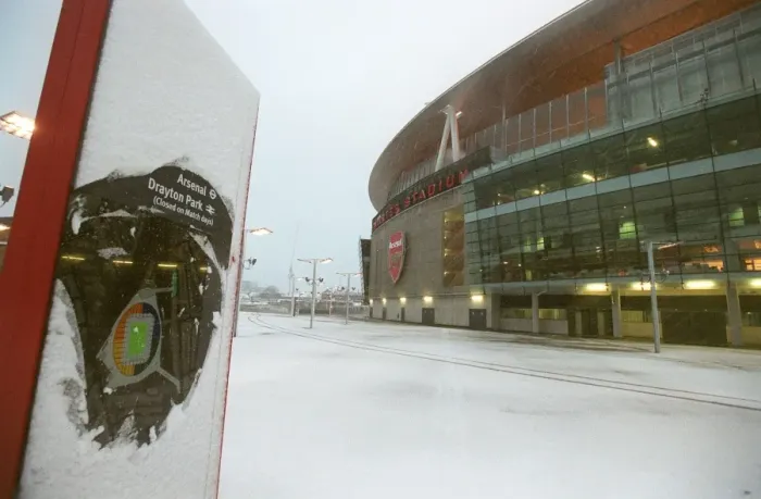 Framed Print : Winter's Embrace at Emirates: A Magical Arsenal Football Ground in Snow Framed Print : Winter's Embrace at Emirates: A Magical Arsenal Football Ground in Snow