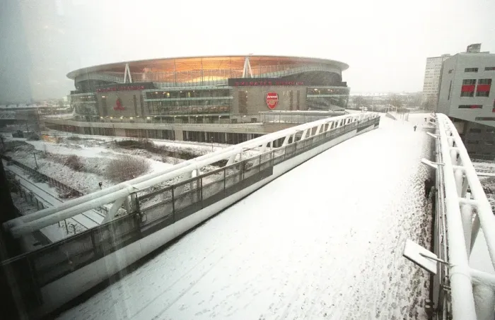 Framed Print : Winter's Enchantment at Emirates: A Football Wonderland in Snow